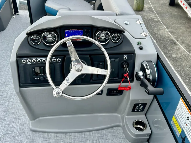 Slide: The Image of Steering console of 2025 Berkshire 22CL2 ARCH CTS 2.75 boat with modern controls. - 15