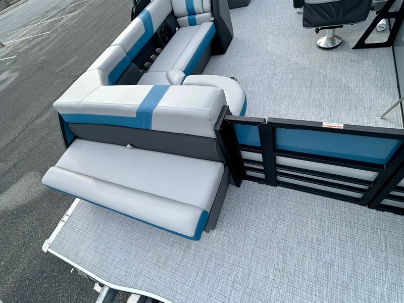 Slide: The Image of 2025 Berkshire 22CL2 ARCH CTS 2.75 pontoon boat interior with gray and blue seating. - 7