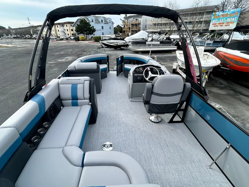 Slide: The Image of 2025 Berkshire 22CL2 ARCH CTS pontoon boat with spacious seating and modern design. - 8