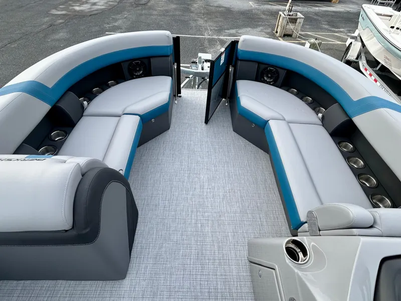 Slide: The Image of 2025 Berkshire 22CL2 ARCH CTS 2.75 pontoon boat interior with gray and blue seating. - 9