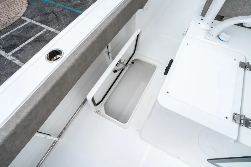 Slide: The Image of 2025 Sea Hunt Gamefish 28 CB boat interior storage compartment. - 21