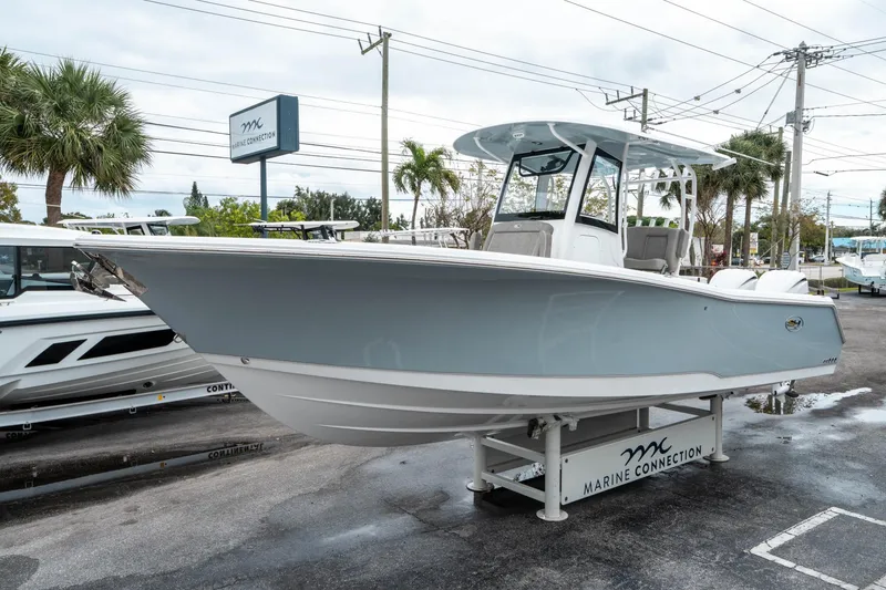 Slide: The Image of 2025 Sea Hunt Gamefish 28 CB boat displayed at Marine Connection dealership. - 6