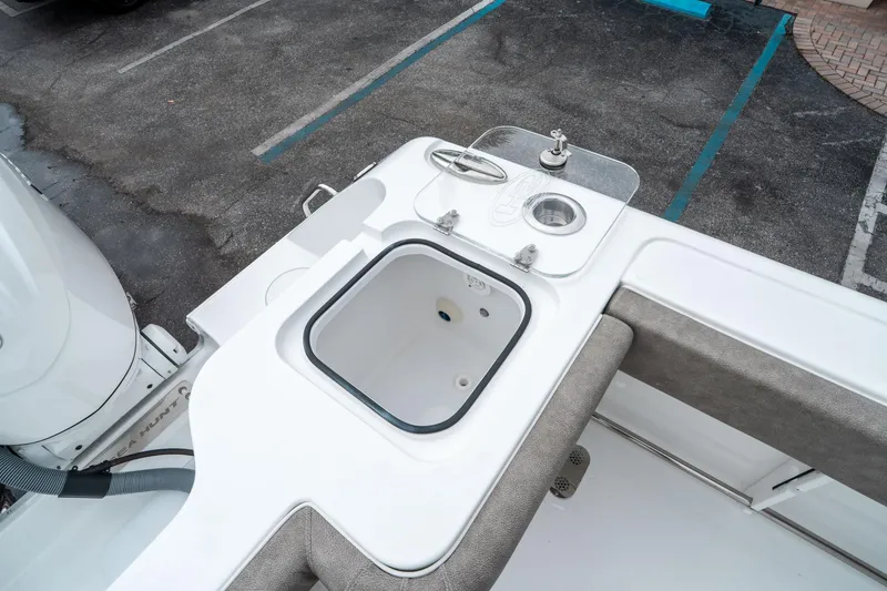 Slide: The Image of 2025 Sea Hunt Gamefish 28 CB boat with livewell and sink on deck. - 14