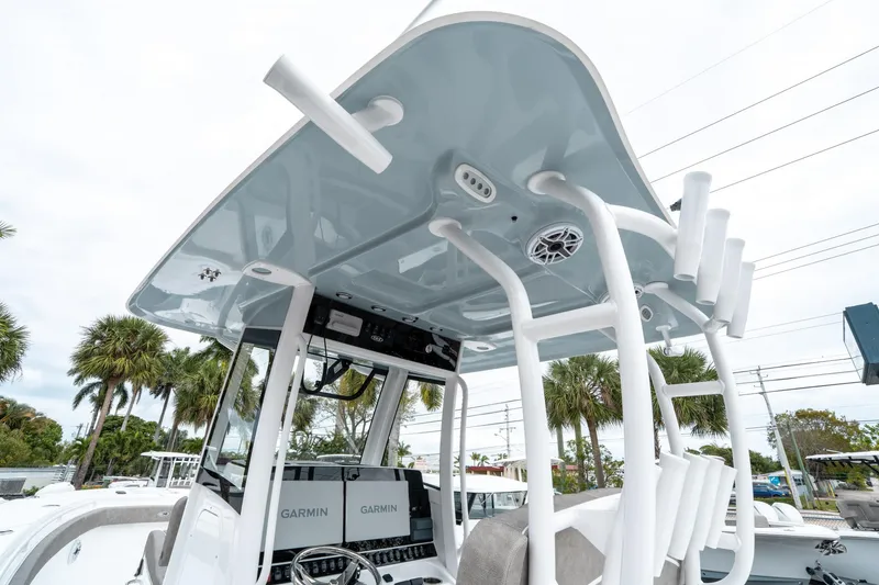 Slide: The Image of 2025 Sea Hunt Gamefish 28 CB boat with advanced Garmin navigation system and sleek design. - 24