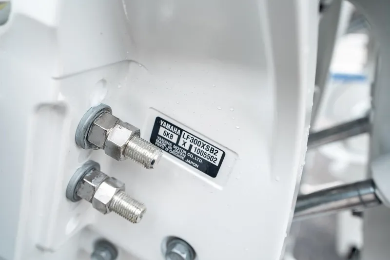 Slide: The Image of Close-up of Yamaha engine bolts on 2025 Sea Hunt Gamefish 28 CB. - 42