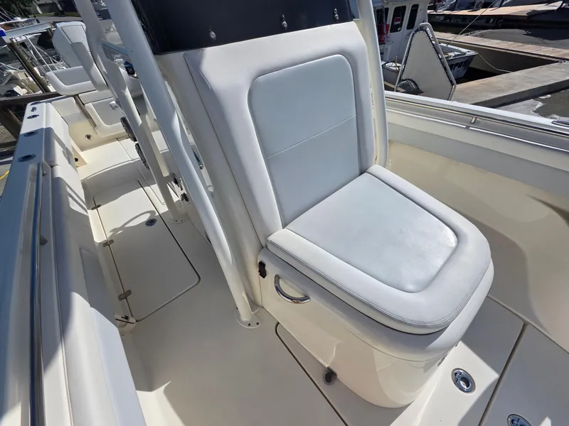 Slide: The Image of Luxury seating on 2021 Blackwood 27 boat, featuring sleek white upholstery and modern design. - 15