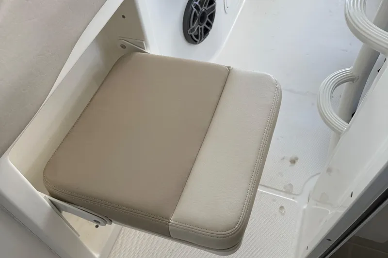 Slide: The Image of Foldable seat on 2016 Boston Whaler 330 Outrage boat interior. - 12