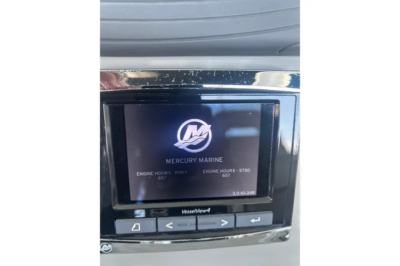 Slide: The Image of Mercury Marine display on 2016 Boston Whaler 330 Outrage showing engine hours. - 24