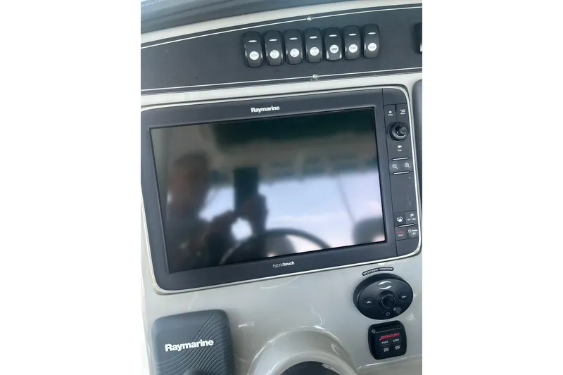 Slide: The Image of Control panel of a 2016 Boston Whaler 330 Outrage with Raymarine display. - 27