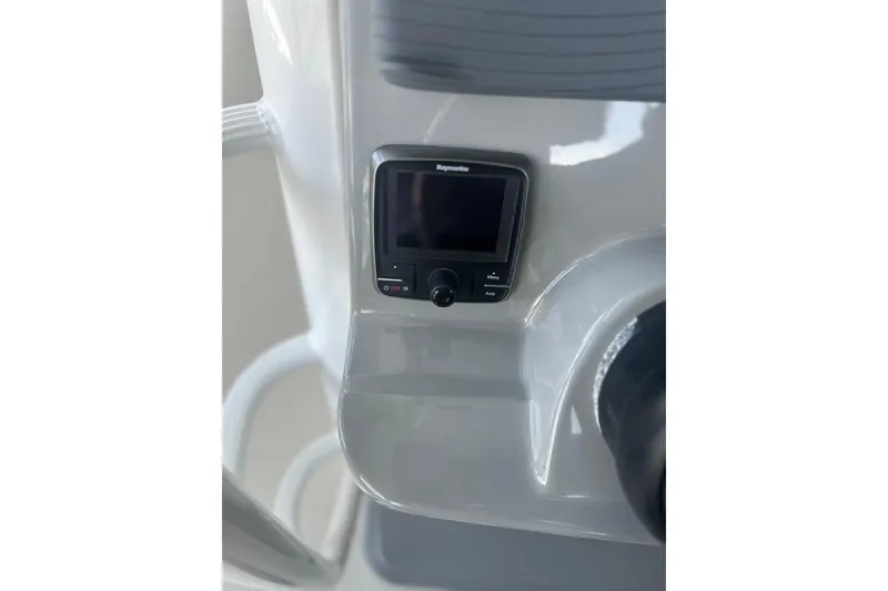 Slide: The Image of Control panel on a 2016 Boston Whaler 330 Outrage boat. - 43