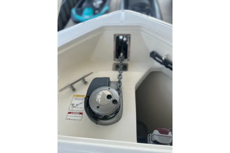 Slide: The Image of 2016 Boston Whaler 330 Outrage anchor system with chain and cleat. - 53