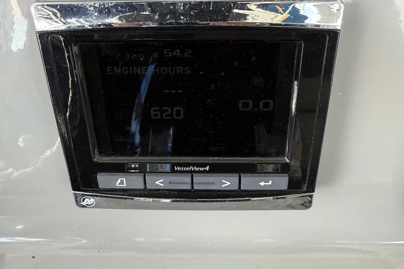 Slide: The Image of Display screen on 2016 Boston Whaler 330 Outrage showing engine hours. - 7