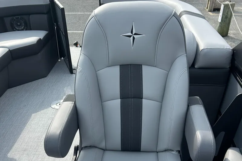 Slide: The Image of 2025 Berkshire 22RFX ARCH CTS 2.75 boat seat, gray with black accents, star emblem. - 14