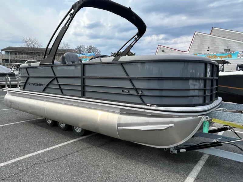 Slide: The Image of 2025 Berkshire 22RFX ARCH CTS 2.75 pontoon boat parked in a lot. - 4