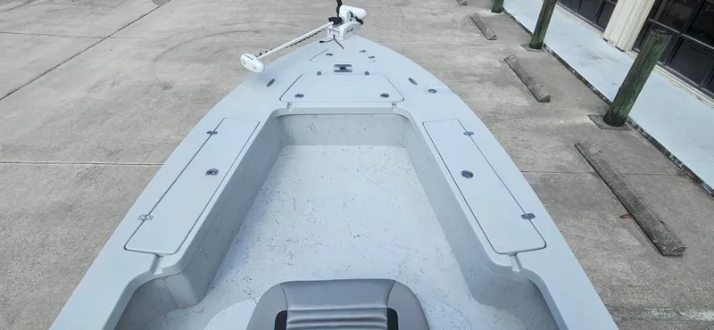 Slide: The Image of 2023 Blazer Bay 2420 GTS boat deck, featuring spacious storage compartments and sleek design. - 17