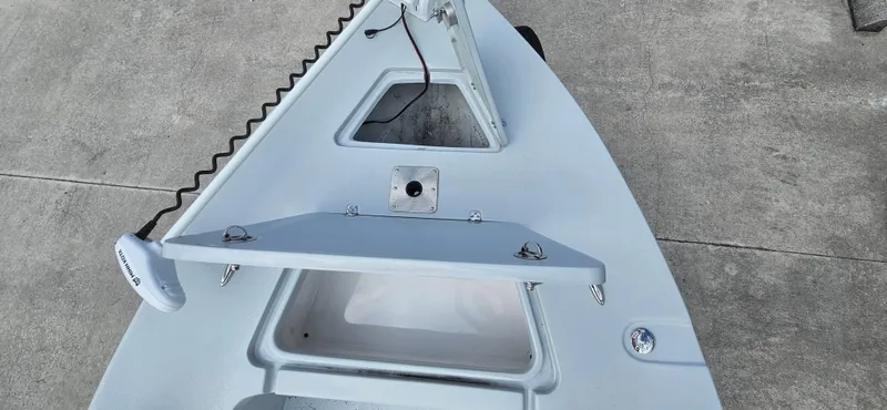 Slide: The Image of 2023 Blazer Bay 2420 GTS boat bow with anchor mount and storage compartment. - 13