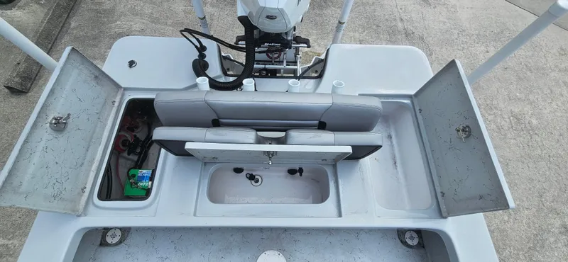 Slide: The Image of 2023 Blazer Bay 2420 GTS boat interior with storage compartments and seating. - 8