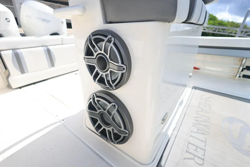 Slide: The Image of 2021 ShearWater 27 Carolina boat speakers and seating detail. - 27