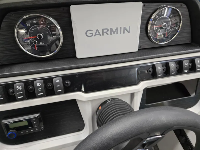 Slide: The Image of Dashboard of 2025 Godfrey Sweetwater 2086 C with Garmin display and gauges. - 10