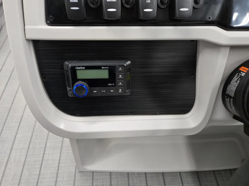 Slide: The Image of Control panel of 2025 Godfrey Sweetwater 2086 C boat with Clarion audio system. - 11