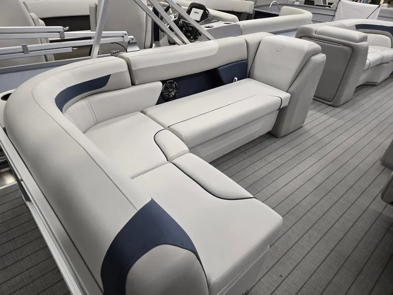 Slide: The Image of 2025 Godfrey Sweetwater 2086 C pontoon boat interior with plush seating and modern design. - 20