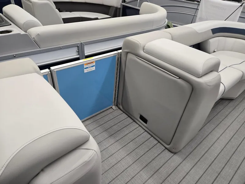 Slide: The Image of 2025 Godfrey Sweetwater 2086 C pontoon boat interior with plush seating. - 24