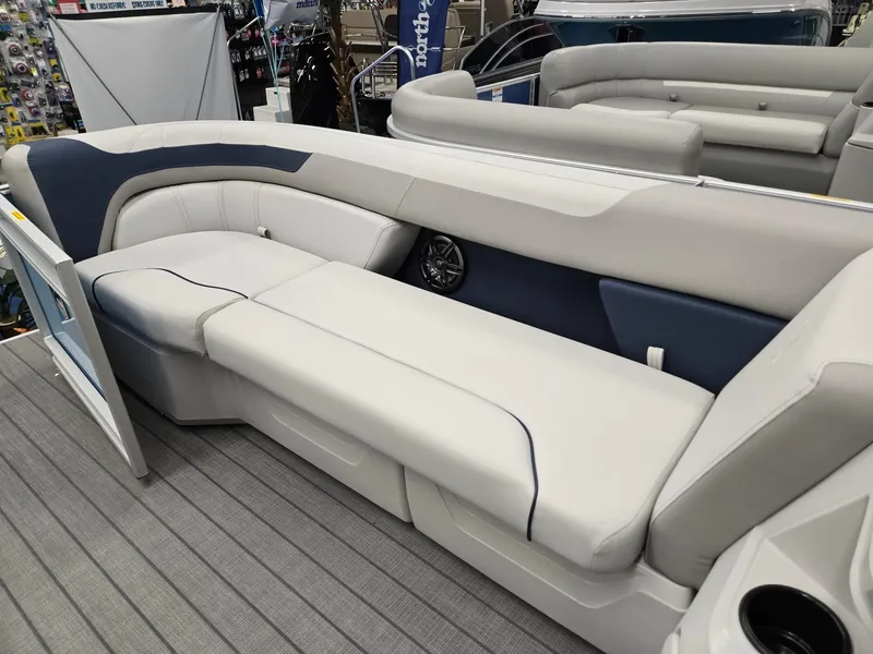 Slide: The Image of 2025 Godfrey Sweetwater 2086 C boat interior with sleek seating and modern design. - 27