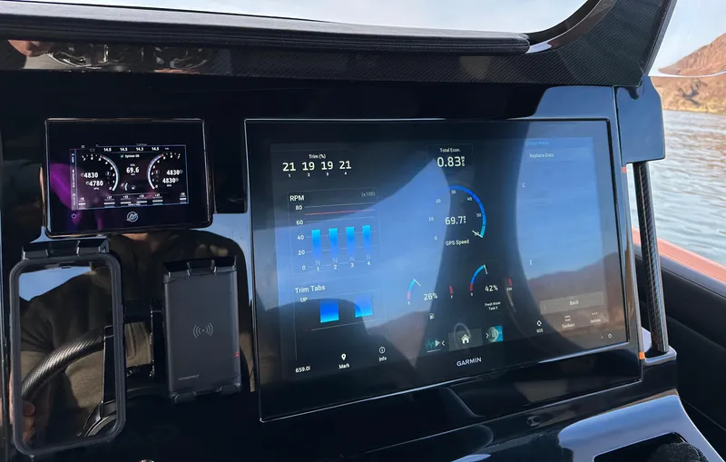 Slide: The Image of Dashboard of 2023 Mystic Powerboats M3800 with digital displays and controls. - 5