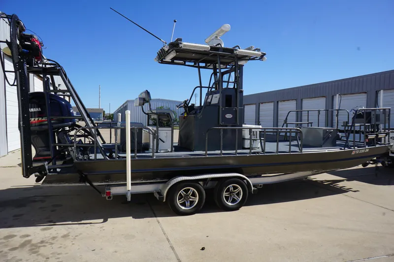 Slide: The Image of 2016 Boat Right 25'8'' Custom Flat on trailer, parked outdoors. - 3