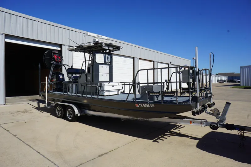 Slide: The Image of 2016 Boat Right 25'8'' Custom Flat on trailer outside storage facility. - 5