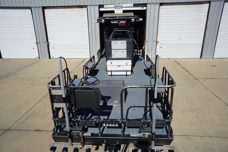 Slide: The Image of 2016 Boat Right 25'8'' Custom Flat boat in storage facility. - 8