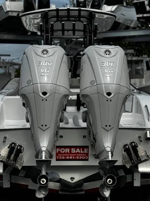 Slide: The Image of 2025 Cape Horn 31T boat with twin 300 V6 engines, for sale sign visible. - 5