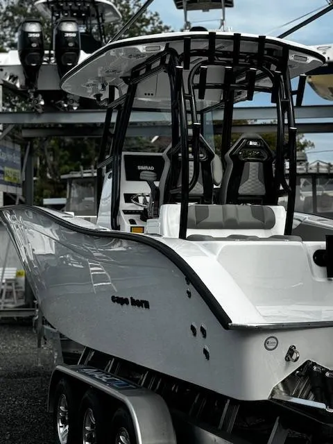 Slide: The Image of 2025 Cape Horn 31T boat on trailer, sleek design, ready for adventure. - 6
