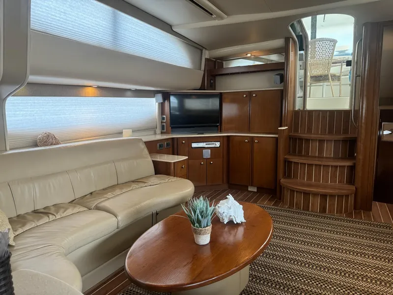 Slide: The Image of Luxurious interior of 2005 Meridian 459 Motoryacht with leather seating and wooden cabinetry. - 10