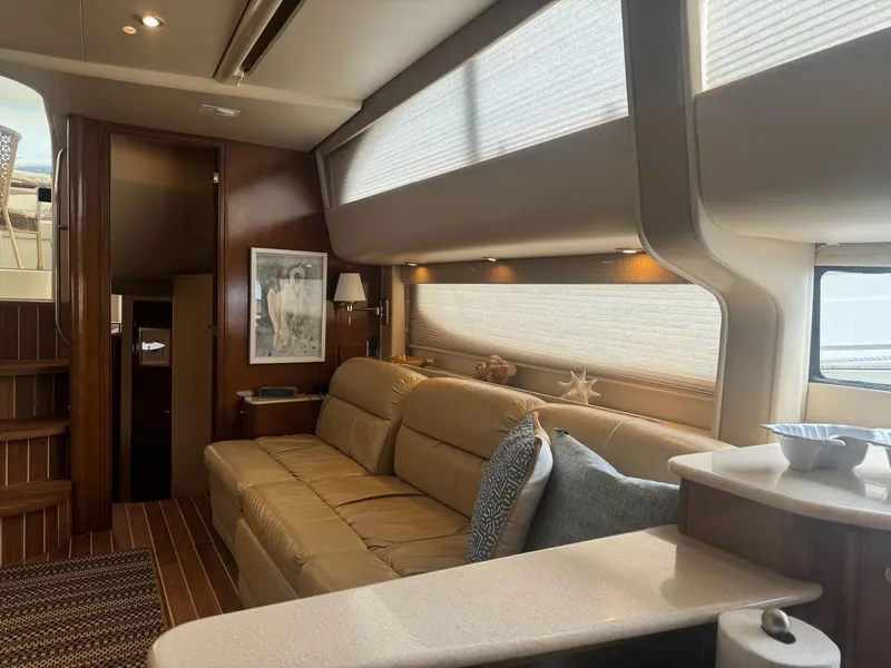 Slide: The Image of Luxurious interior of 2005 Meridian 459 Motoryacht with beige sofa and elegant decor. - 16