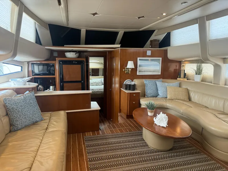 Slide: The Image of Luxurious interior of a 2005 Meridian 459 Motoryacht with elegant seating and decor. - 24