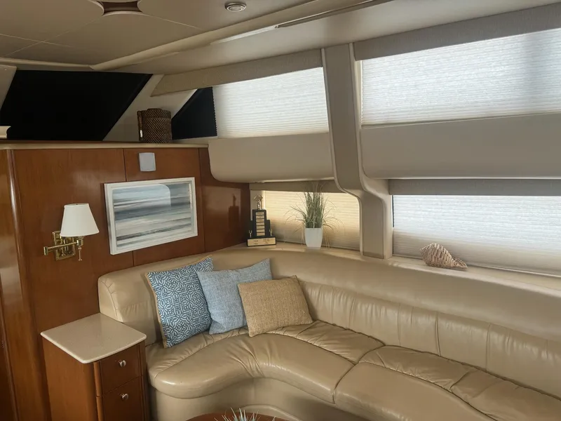 Slide: The Image of Luxurious interior of 2005 Meridian 459 Motoryacht with beige leather seating and decor. - 4