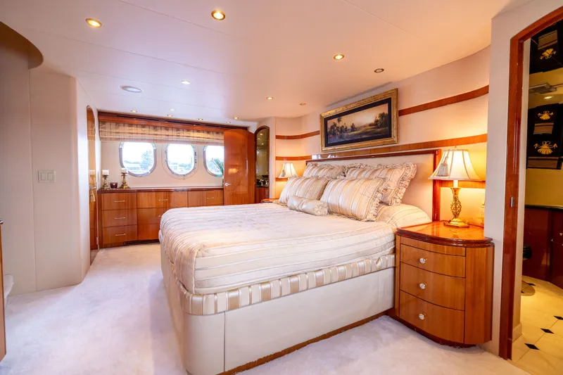 Slide: The Image of Luxurious bedroom interior of 2005 Hatteras 80 Motor Yacht with elegant furnishings. - 30