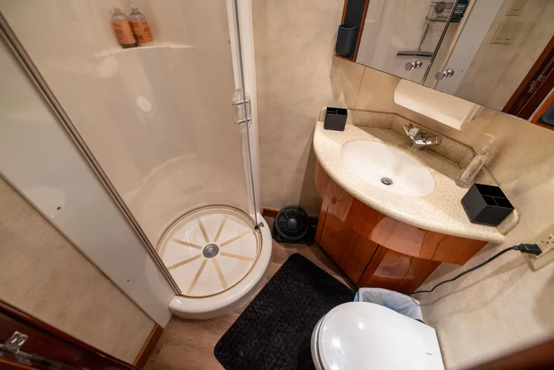 Slide: The Image of Bathroom interior of 2005 Hatteras 80 Motor Yacht with shower and sink. - 48