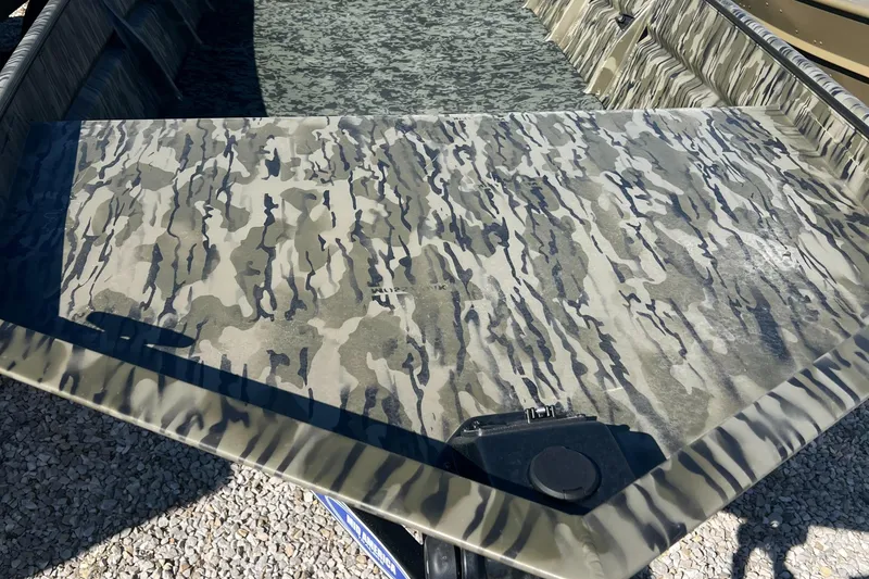 Slide: The Image of 2025 SeaArk 1652 MVJT boat with camouflage pattern detailing. - 3