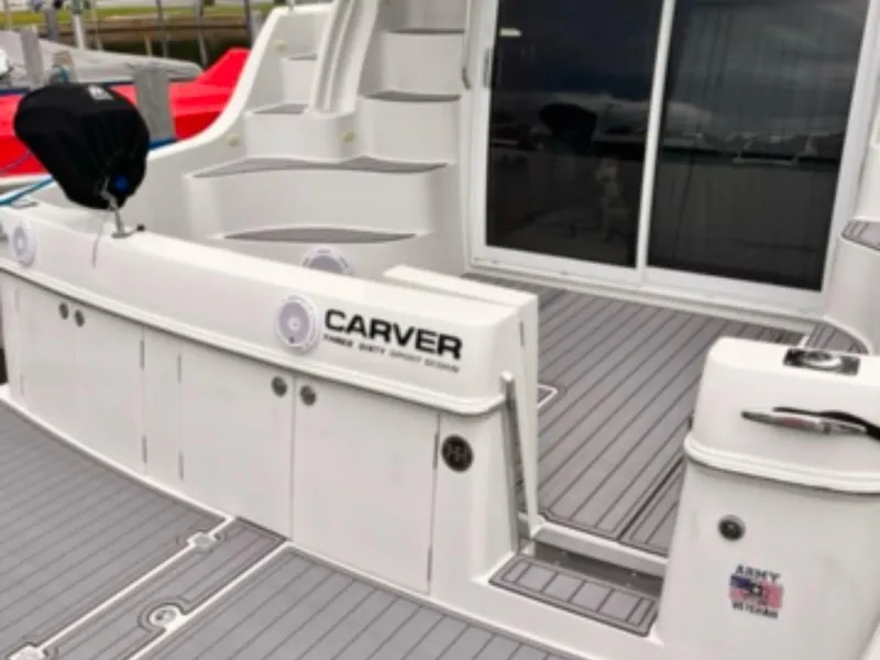 Slide: The Image of 2004 Carver 360 Sport Sedan boat deck with sleek design and modern features. - 25