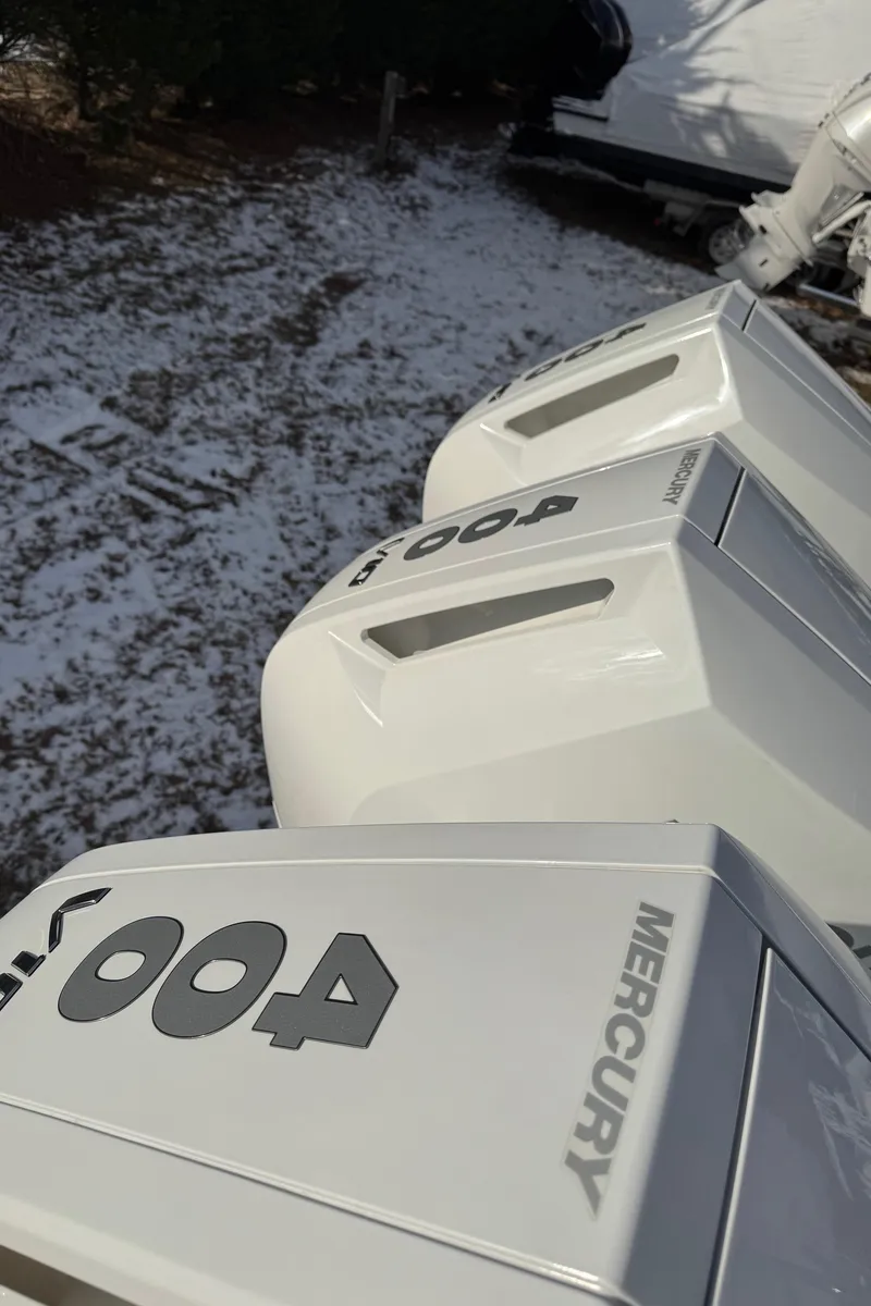 Slide: The Image of Triple Mercury 400 outboard engines on a 2025 Cape Horn 36 XS boat. - 13