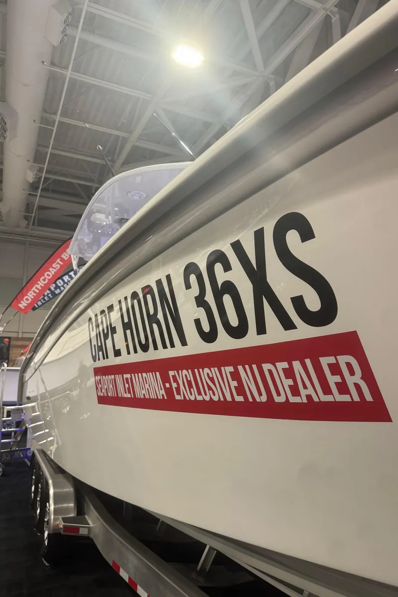 Slide: The Image of 2025 Cape Horn 36 XS boat displayed at an exclusive NJ dealer event. - 21