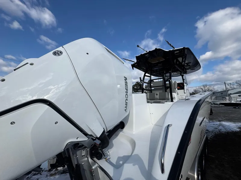 Slide: The Image of Cape Horn 36 XS 2025 boat with Mercury engine under a blue sky. - 8