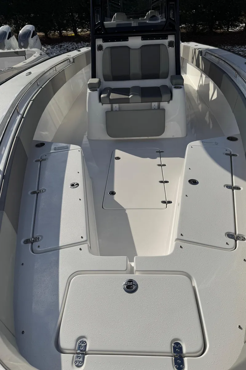 Slide: The Image of 2025 Cape Horn 36 XS boat seating with gray cushions and cup holder. - 11