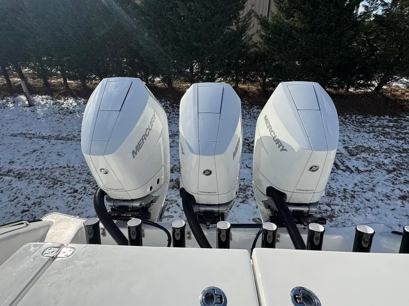 Slide: The Image of 2025 Cape Horn 36 XS boat on trailer, featuring dual outboard engines. - 6