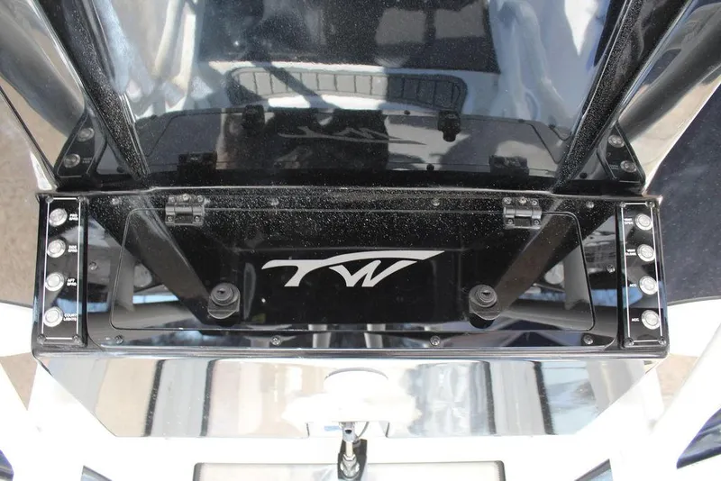 Slide: The Image of 2025 Tidewater 2410 BM boat console with TW logo and sleek design. - 17
