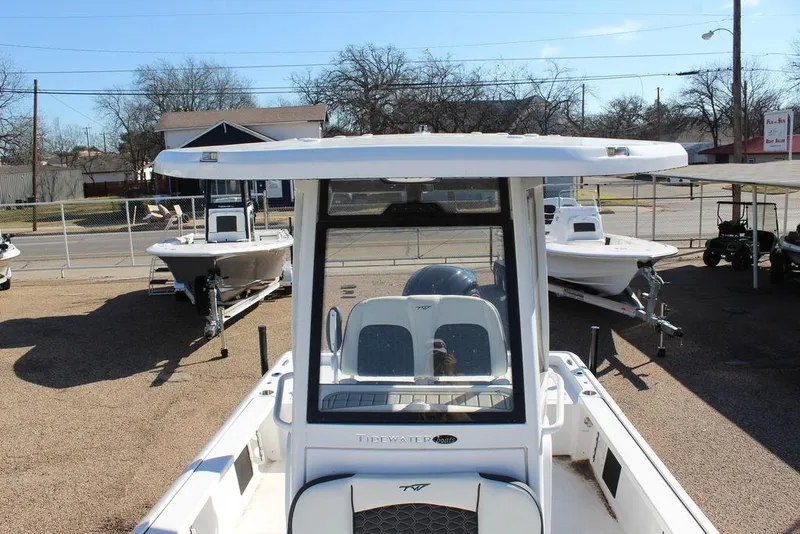 Slide: The Image of 2025 Tidewater 2410 BM boat displayed outdoors, showcasing its sleek design and modern features. - 20