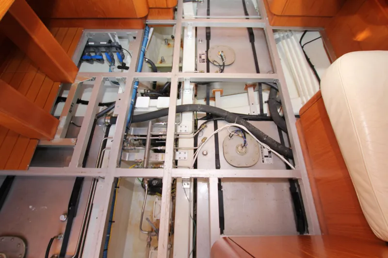 Slide: The Image of Interior view of 2006 Nautor Swan 46mkIII yacht showing underfloor wiring and plumbing. - 31