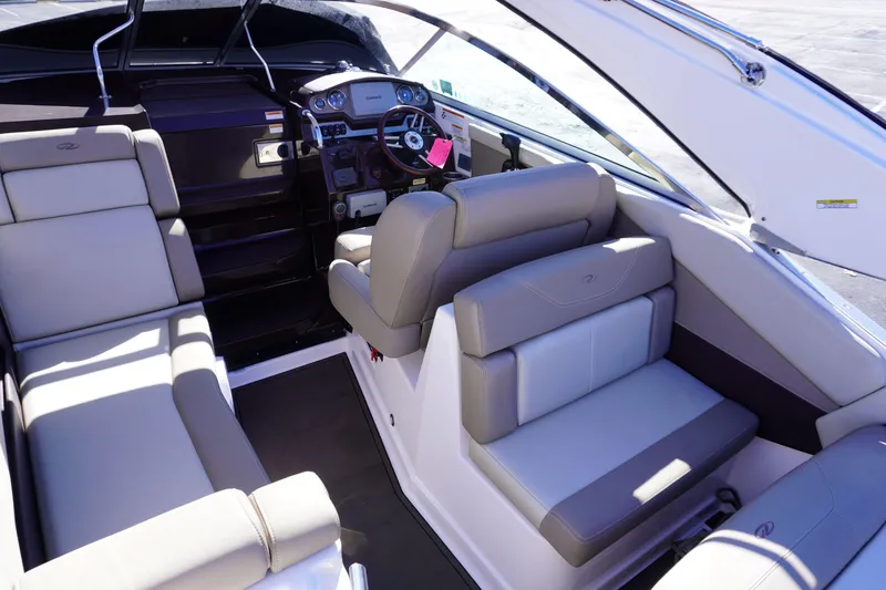 Slide: The Image of Interior of 2013 Regal 28 Express boat with seating and helm. - 6